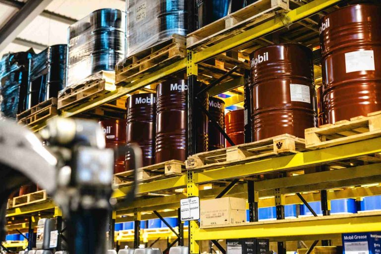 Photo of oil drums in a warehouse